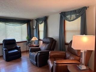 114 S Appleton St, Sugar Creek, MO 64054 - living area with wood finished floors