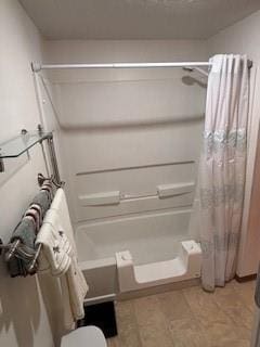 114 S Appleton St, Sugar Creek, MO 64054 - full bathroom featuring shower / tub combo with curtain and tile patterned floors