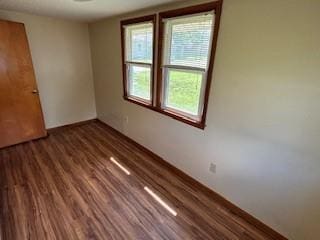 114 S Appleton St, Sugar Creek, MO 64054 - empty room featuring wood finished floors