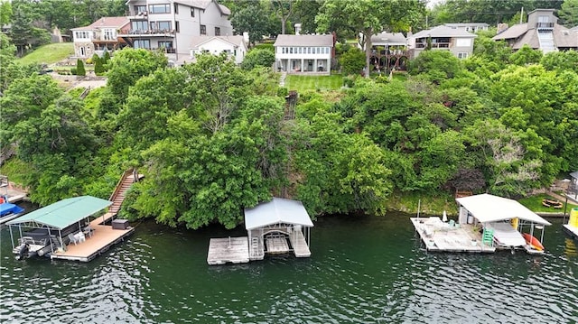 3 M St, Lake Lotawana, MO 64086 - drone / aerial view of a large body of water and a tree filled landscape