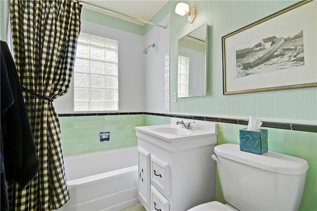 3 M St, Lake Lotawana, MO 64086 - full bathroom featuring shower / bath combo, vanity, and wainscoting