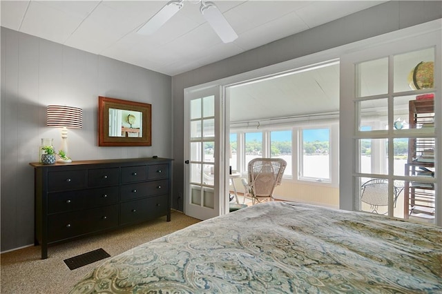 3 M St, Lake Lotawana, MO 64086 - carpeted bedroom with a water view and ceiling fan