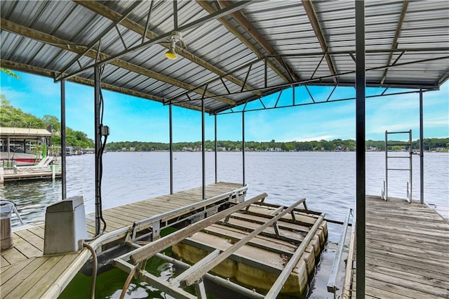 3 M St, Lake Lotawana, MO 64086 - dock featuring boat lift and a water view
