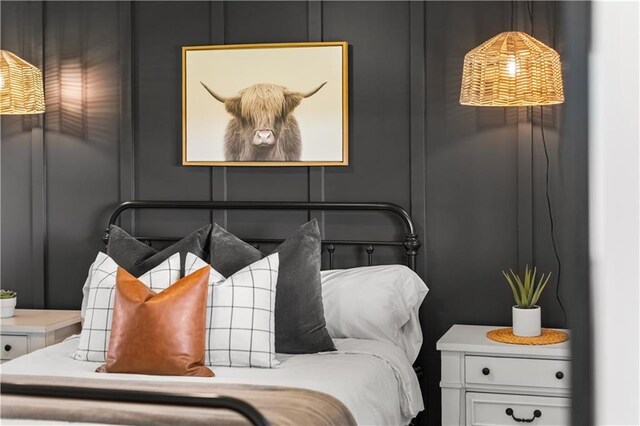 1372 N 150th Rd, Baldwin City, KS 66006 - bedroom featuring a decorative wall