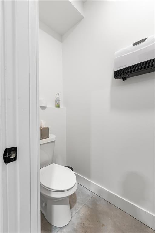 1372 N 150th Rd, Baldwin City, KS 66006 - bathroom with concrete floors and an AC wall unit