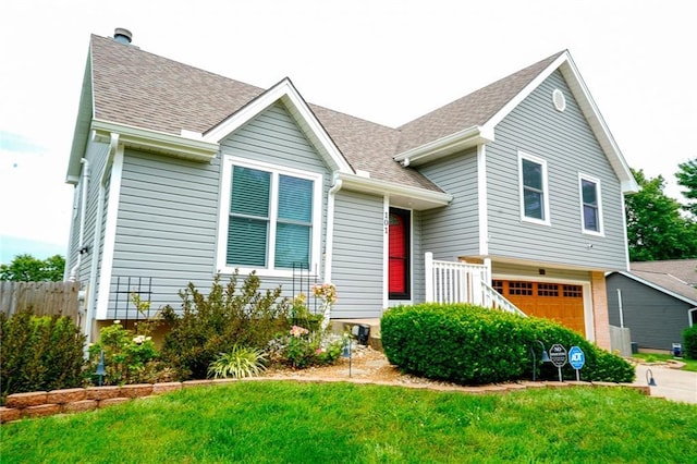 101 Shasta Daisy Dr, Smithville, MO 64089 - split level home with an attached garage and a shingled roof