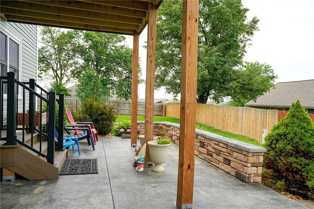 101 Shasta Daisy Dr, Smithville, MO 64089 - fenced backyard with a patio