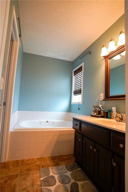 101 Shasta Daisy Dr, Smithville, MO 64089 - bathroom featuring vanity, a bath, and a textured ceiling