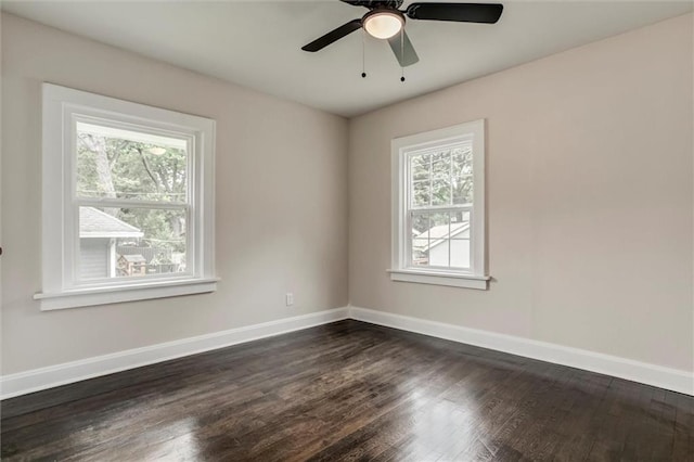 826 W 75th St, Kansas City, MO 64114 - spare room with plenty of natural light, dark wood-style floors, and ceiling fan