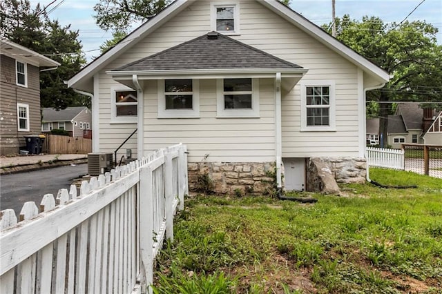 826 W 75th St, Kansas City, MO 64114 - back of house featuring a shingled roof