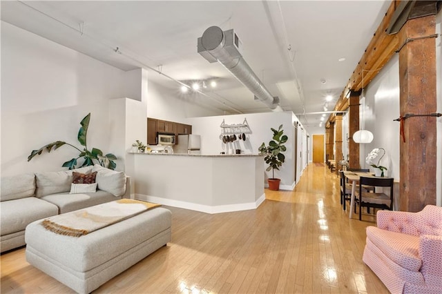 200 Main St Unit 509, Kansas City, MO 64105 - living room featuring light wood-type flooring