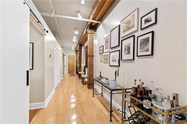 200 Main St Unit 509, Kansas City, MO 64105 - hall with light wood-style flooring and a barn door