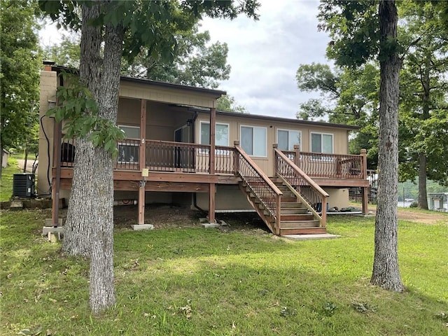 964 Cable Point Dr, Climax Springs, MO 65324 - rear view of house with stairs, a deck, a yard, and a chimney