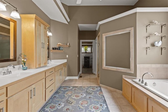 5814 Aminda St, Shawnee, KS 66226 - bathroom featuring tile patterned floors, double vanity, and a bath