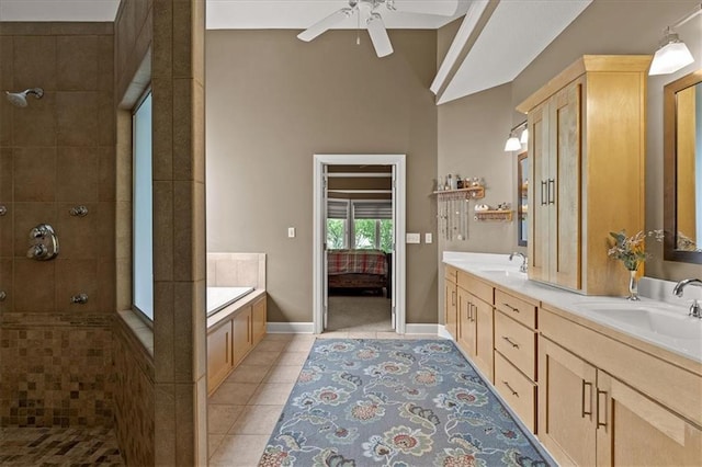 5814 Aminda St, Shawnee, KS 66226 - full bathroom with tile patterned floors, double vanity, a garden tub, and tiled shower