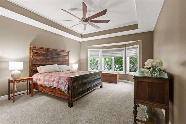 5814 Aminda St, Shawnee, KS 66226 - bedroom featuring a tray ceiling, light colored carpet, a ceiling fan, and crown molding