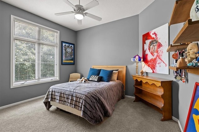 5814 Aminda St, Shawnee, KS 66226 - carpeted bedroom with baseboards and ceiling fan