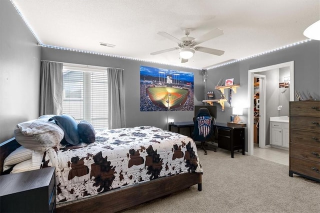 5814 Aminda St, Shawnee, KS 66226 - bedroom with light colored carpet, ceiling fan, and ensuite bath