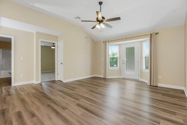 21119 E 8th St S, Independence, MO 64056 - empty room with ceiling fan, vaulted ceiling, and wood finished floors
