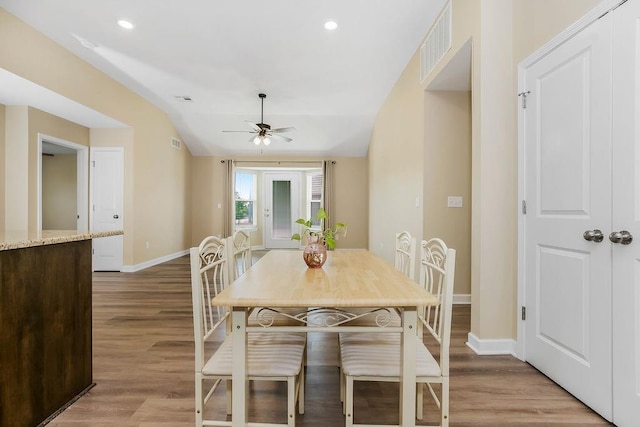 21119 E 8th St S, Independence, MO 64056 - dining space with a ceiling fan, light wood-style flooring, lofted ceiling, and recessed lighting