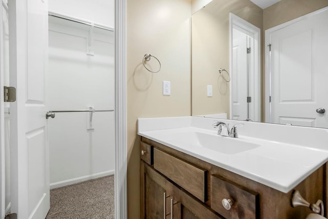 21119 E 8th St S, Independence, MO 64056 - bathroom featuring vanity and baseboards