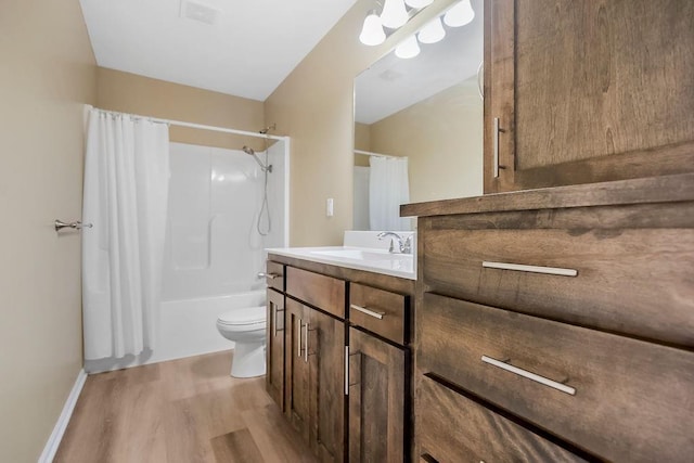 21119 E 8th St S, Independence, MO 64056 - bathroom with wood finished floors, vanity, and shower / bath combo