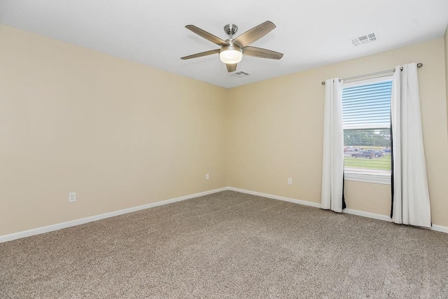 21119 E 8th St S, Independence, MO 64056 - spare room featuring carpet flooring and ceiling fan