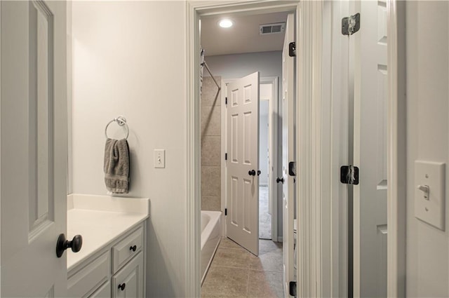 9624 N Arlington Ave, Kansas City, MO 64158 - full bath featuring vanity, tile patterned flooring, and bathtub / shower combination