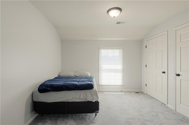 9624 N Arlington Ave, Kansas City, MO 64158 - bedroom with carpet floors and lofted ceiling