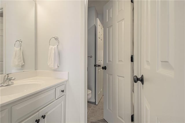 9624 N Arlington Ave, Kansas City, MO 64158 - bathroom featuring vanity and tile patterned flooring
