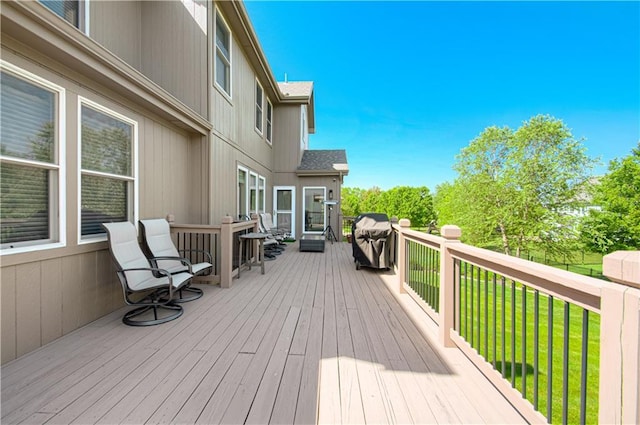 9624 N Arlington Ave, Kansas City, MO 64158 - deck with a lawn