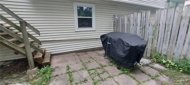 1431-33 E Penrose Ln, Olathe, KS 66062 - view of patio / terrace featuring a grill