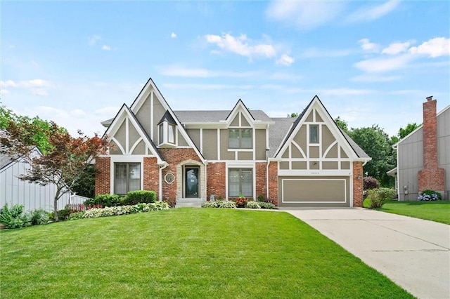 9805 W 121st Ter, Overland Park, KS 66213 - tudor home featuring driveway, a front lawn, and brick siding