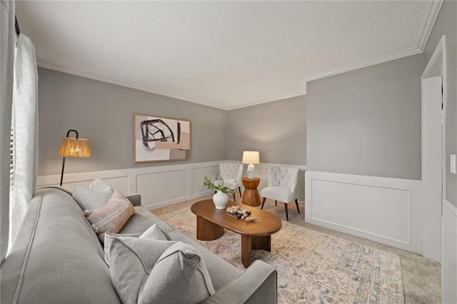9805 W 121st Ter, Overland Park, KS 66213 - carpeted living area with a decorative wall, crown molding, and wainscoting
