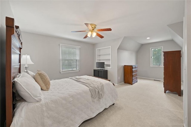 9805 W 121st Ter, Overland Park, KS 66213 - bedroom with light colored carpet, lofted ceiling, and ceiling fan