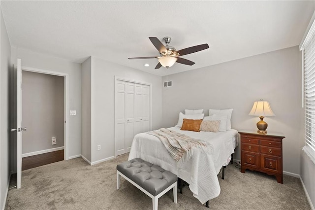 9805 W 121st Ter, Overland Park, KS 66213 - bedroom with a closet, light carpet, and a ceiling fan