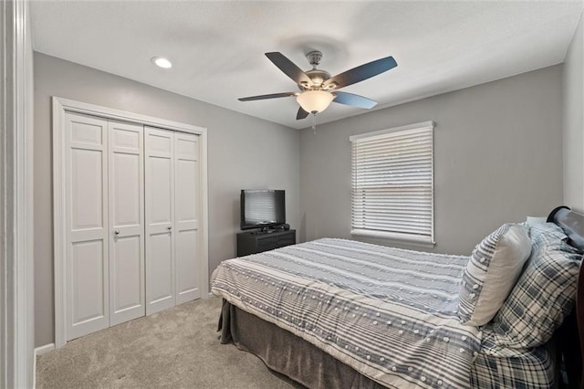 9805 W 121st Ter, Overland Park, KS 66213 - bedroom with carpet flooring, a closet, a ceiling fan, and recessed lighting