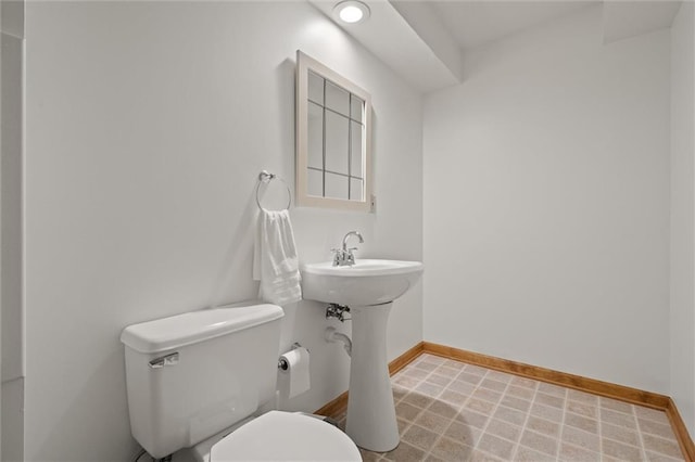 9805 W 121st Ter, Overland Park, KS 66213 - half bath with toilet and baseboards