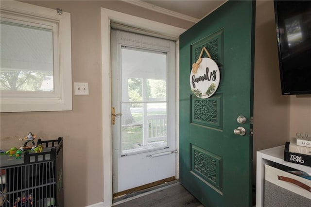 1934 E Mechanic Ave, Independence, MO 64050 - doorway to outside featuring wood finished floors and crown molding