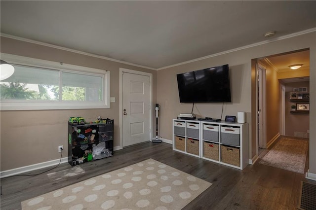 1934 E Mechanic Ave, Independence, MO 64050 - living room featuring dark wood-style floors and ornamental molding
