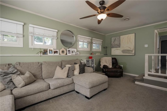 1934 E Mechanic Ave, Independence, MO 64050 - carpeted living area with ceiling fan, plenty of natural light, and crown molding