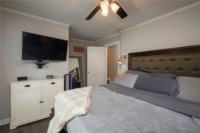 1934 E Mechanic Ave, Independence, MO 64050 - bedroom featuring dark wood-style flooring, ornamental molding, and a ceiling fan