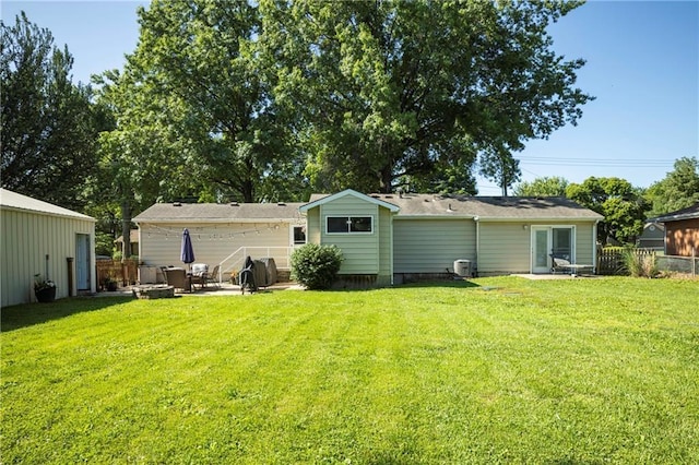 1934 E Mechanic Ave, Independence, MO 64050 - rear view of house with a patio