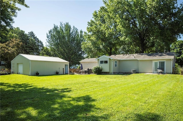 1934 E Mechanic Ave, Independence, MO 64050 - view of green lawn featuring an outbuilding
