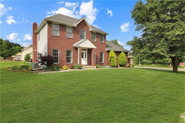 1503 Nottingham Dr, Warrensburg, MO 64093 - colonial inspired home featuring a chimney, a front lawn, brick siding, and roof with shingles