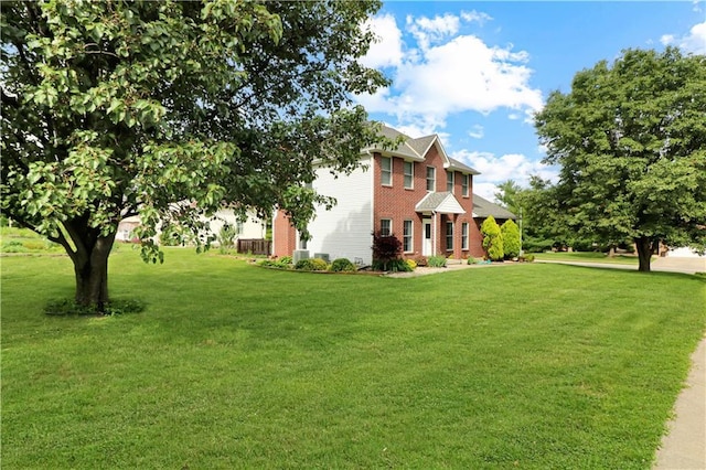 1503 Nottingham Dr, Warrensburg, MO 64093 - colonial house featuring brick siding and a front yard