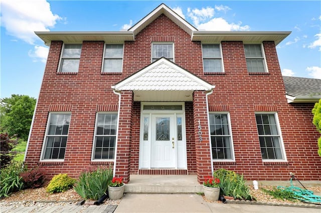 1503 Nottingham Dr, Warrensburg, MO 64093 - view of front of property featuring brick siding