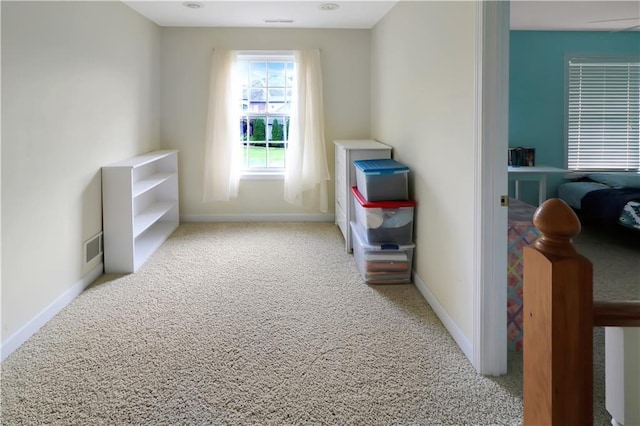 1503 Nottingham Dr, Warrensburg, MO 64093 - hall featuring carpet floors and baseboards