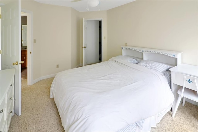 1503 Nottingham Dr, Warrensburg, MO 64093 - bedroom featuring light colored carpet and ceiling fan