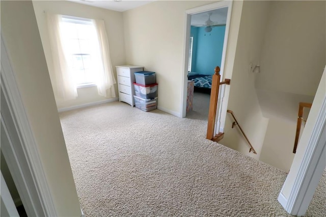 1503 Nottingham Dr, Warrensburg, MO 64093 - carpeted empty room with baseboards